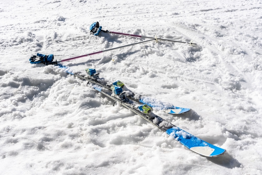 A view of a pair of skiis and ski poles