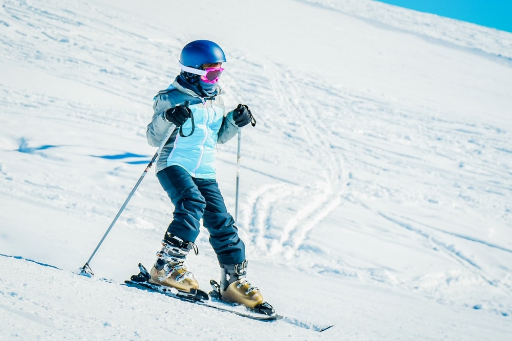 A view of a person skiing in extreme snow