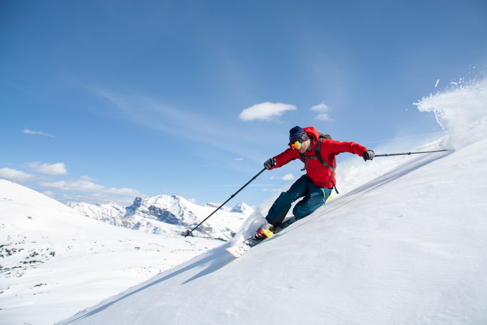 A view of a professional skier skiing in snow