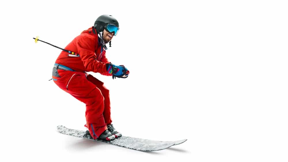 Skiing Sport Side View Sportsman In A Red Ski Suit