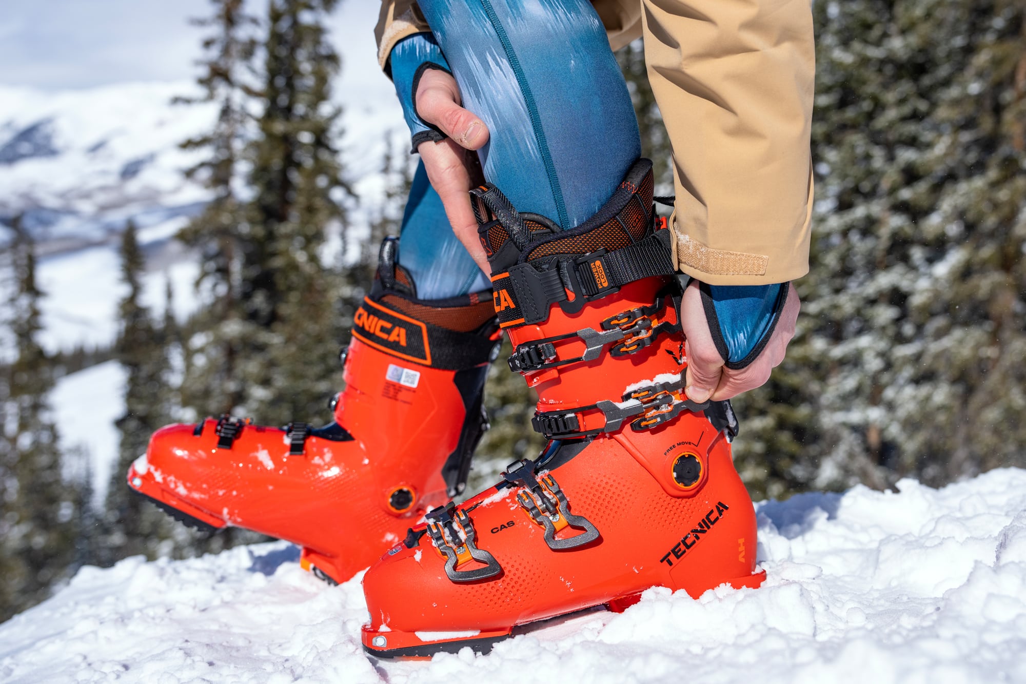 a skier wearing red ski boots