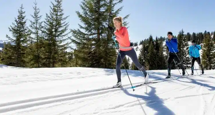 people doing classic skiing