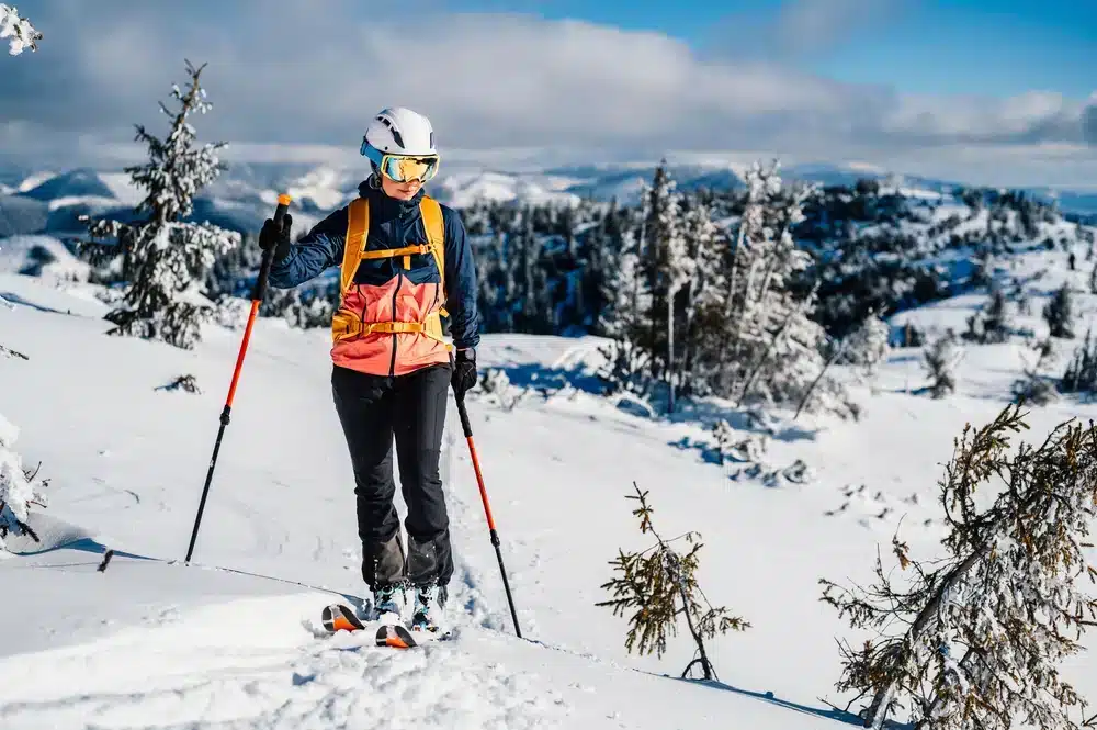 Mountaineer backcountry ski walking ski woman alpinist in the mountains S