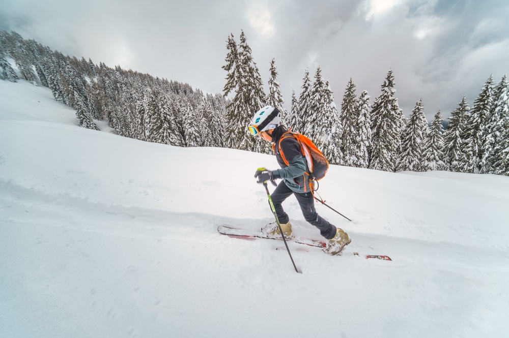 Small Boy Practicing Uphill Ski Mountaineering