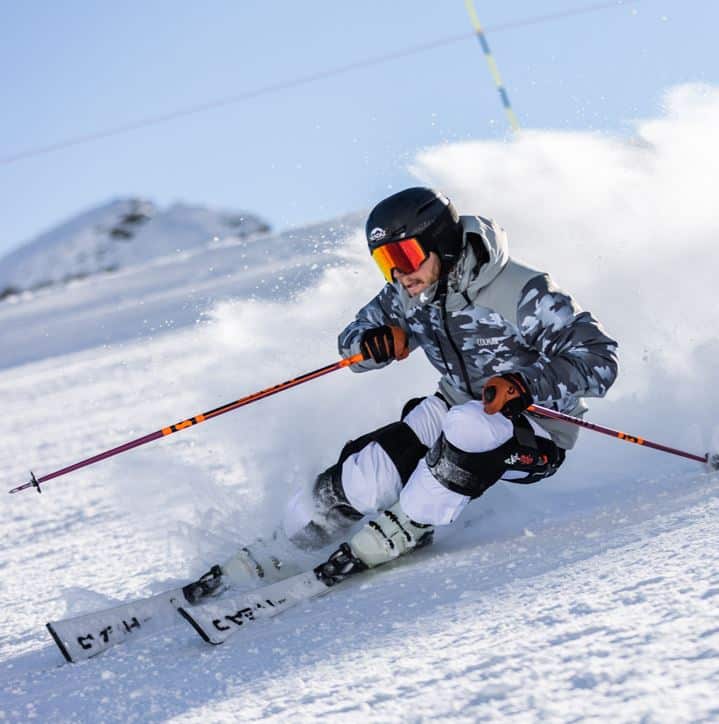 a skier skiing wearing Ski Mojo  brace