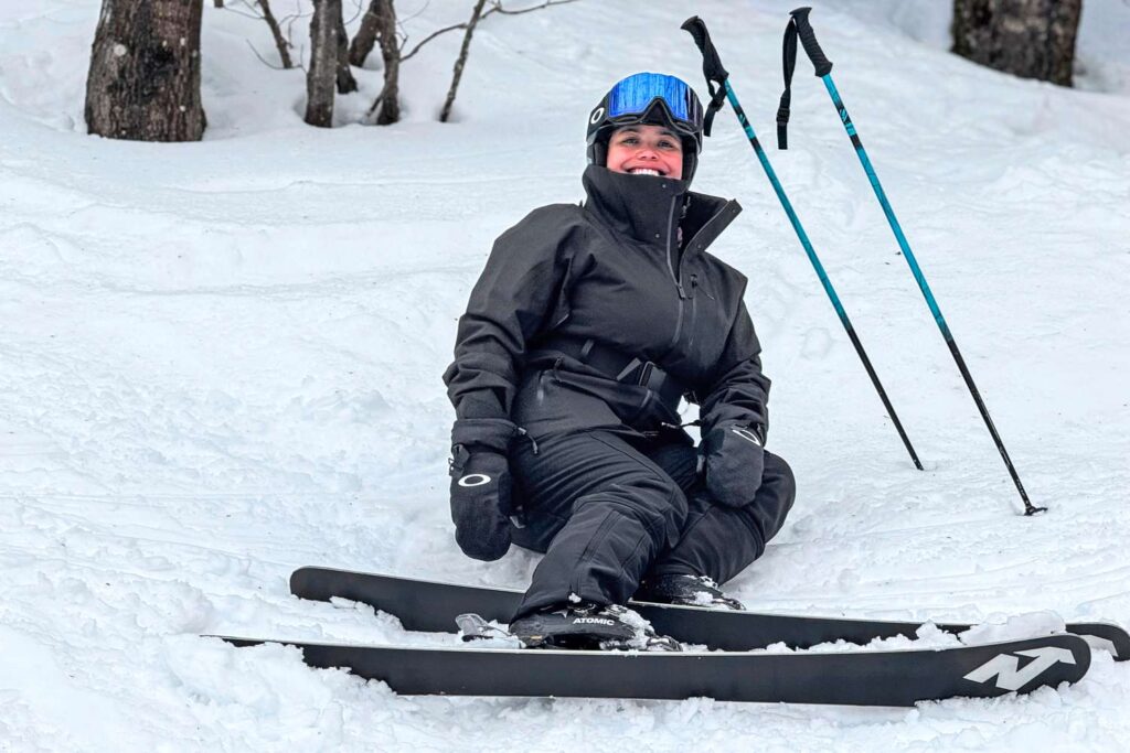 A view of woman skiing on snow A view of woman skiing on snow