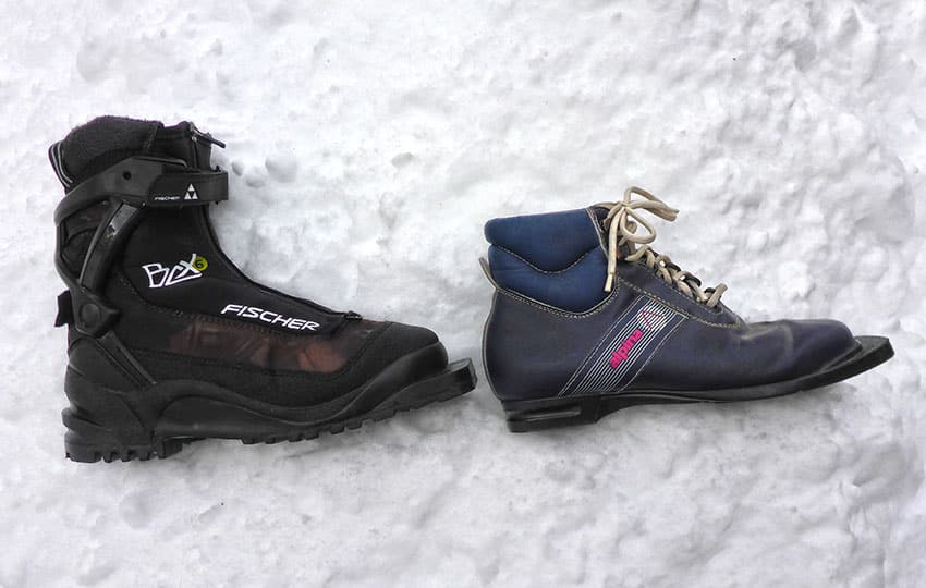 A view of two boots lying in snow A view of two boots lying in snow