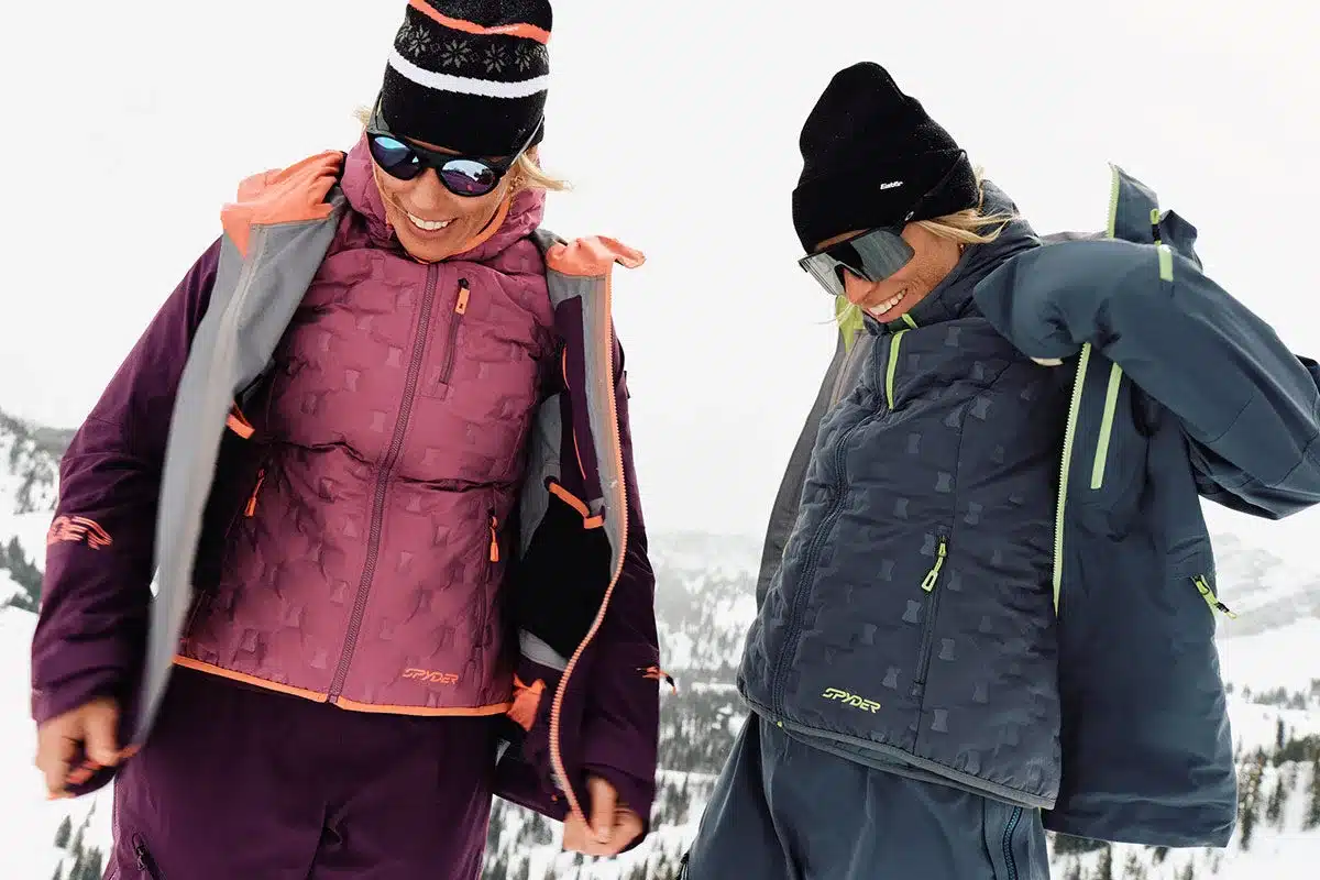 female skiers all dressed up and wearing goggles female skiers all dressed up and wearing goggles